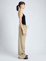 Side full length image of model wearing Jade Pant in Eco Stretch Linen Viscose in BRONZE