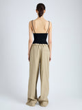 Back full length image of model wearing Jade Pant in Eco Stretch Linen Viscose in BRONZE