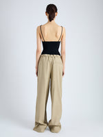 Back full length image of model wearing Jade Pant in Eco Stretch Linen Viscose in BRONZE