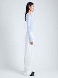 Side image of model wearing Pant in Crinkle Cotton Poplin in white