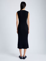 Back full length image of model wearing Tatum Knit Dress in Silk Viscose in BLACK