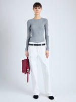 Front full length image of model wearing Cassidy Sweater in Superfine Merino Silk in LIGHT GREY MELANGE