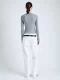 Back full length image of model wearing Cassidy Sweater in Superfine Merino Silk in LIGHT GREY MELANGE