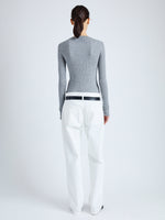 Back full length image of model wearing Cassidy Sweater in Superfine Merino Silk in LIGHT GREY MELANGE