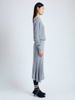 Side full length image of model wearing Eden Knit Dress in Superfine Merino Silk in LIGHT GREY MELANGE