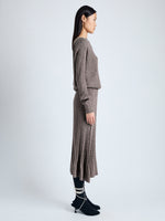 Side image of model wearing Eden Knit Dress in Superfine Merino Silk in taupe