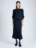 Front full length image of model wearing Eden Knit Dress in Superfine Merino Silk in NAVY