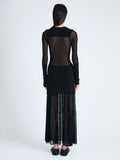 Back image of model wearing Anita Knit Dress in Sheer Mesh in BLACK