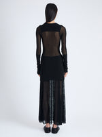 Back image of model wearing Anita Knit Dress in Sheer Mesh in BLACK