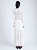 Back full length image of model wearing Anita Knit Dress in Sheer Mesh in OFF WHITE