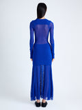 Back image of model wearing Anita Knit Dress in Sheer Mesh in Bright Blue