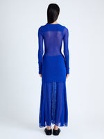 Back image of model wearing Anita Knit Dress in Sheer Mesh in Bright Blue