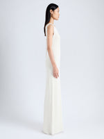 Side full length image of model wearing Silvia Knit Dress In Silk Doubleface Boucle in PEARL