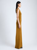 Side full length image of model wearing Silvia Knit Dress In Silk Doubleface Boucle in CIDER