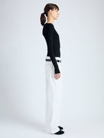 Side image of model wearing Boyd Henley in Silk Viscose in black