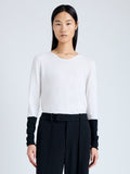 Cropped front image of model wearing Lewis Sweater in Featherweight Cotton Silk in white multi