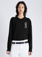 Cropped front image of model wearing Harrison Monogram Sweater in Wool Jacquard in black