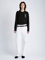 Front image of model wearing Harrison Monogram Sweater in Wool Jacquard in black