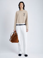 Front image of model wearing Harrison Monogram Sweater in Wool Jacquard in oatmeal