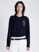 Cropped front  image of model wearing Harrison Monogram Sweater in Wool Jacquard in navy