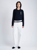 Front image of model wearing Harrison Monogram Sweater in Wool Jacquard in navy