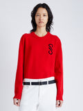 Front cropped image of model wearing Harrison Monogram Sweater in Wool Jacquard in red