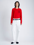 Front image of model wearing Harrison Monogram Sweater in Wool Jacquard in red