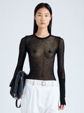 Front cropped image of model wearing Willa Sweater in Sheer Mesh in black