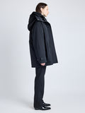 Proenza Schouler Side image of model wearing Wilder Coat in Stretch Nylon with Fleece in BLACK