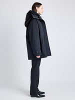 Proenza Schouler Side image of model wearing Wilder Coat in Stretch Nylon with Fleece in BLACK