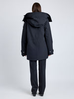 Proenza Schouler Back image of model wearing Wilder Coat in Stretch Nylon with Fleece in BLACK