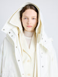 Proenza Schouler Detail image of model wearing Wilder Coat in Stretch Nylon with Fleece in MIST