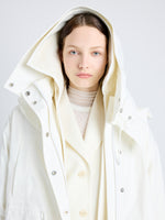 Proenza Schouler Detail image of model wearing Wilder Coat in Stretch Nylon with Fleece in MIST