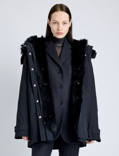 Proenza Schouler cropped front image of model wearing Wilder Coat in Stretch Nylon with Shearling Lining in black