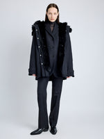 Proenza Schouler front image of model wearing Wilder Coat in Stretch Nylon with Shearling Lining in black