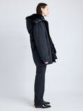 Proenza Schouler side image of model wearing Wilder Coat in Stretch Nylon with Shearling Lining in black