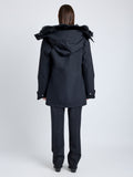 Proenza Schouler back image of model wearing Wilder Coat in Stretch Nylon with Shearling Lining in black