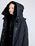 Proenza Schouler detail image of model wearing Wilder Coat in Stretch Nylon with Shearling Lining in black