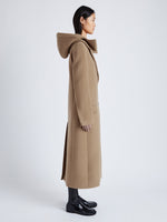 Proenza Schouler Side full length image of model wearing Reed Coat in Brushed Melange Wool with Hood in CAMEL MELANGE