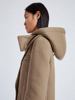 Proenza Schouler Detail image of model wearing Reed Coat in Brushed Melange Wool with Hood in CAMEL MELANGE