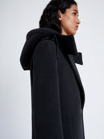 Proenza Schouler Detail image of model wearing Reed Coat in Brushed Melange Wool with Hood in CHARCOAL MELANGE