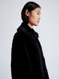 Proenza Schouler Detail image of model wearing Fiona Coat in Shearling in BLACK