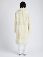 Proenza Schouler Back full length image of model wearing Fiona Coat in Shearling in RESIN