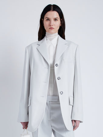 Proenza Schouler Front cropped image of model wearing Archer Jacket in Wool Twill Suiting in SMOKE