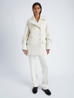 Proenza Schouler Front full length image of model wearing Rowen Coat in Eco Double Face Wool in ECRU