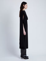 Proenza Schouler Side full length image of model wearing Maude Dress in Matte Viscose Crepe in BLACK