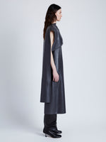 Side image of model wearing Maude Dress in Leather in slate