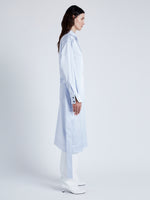 Proenza Schouler Side full length image of model wearing Andy Dress in Technical Satin in BABY BLUE