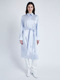 Proenza Schouler Front full length image of model wearing Andy Dress in Technical Satin in BABY BLUE with belt tied