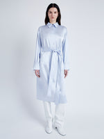 Proenza Schouler Front full length image of model wearing Andy Dress in Technical Satin in BABY BLUE with belt tied